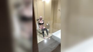 Breasty angel watches porn and jerks off on the crapper, peeping