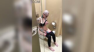 Breasty angel watches porn and jerks off on the crapper, peeping