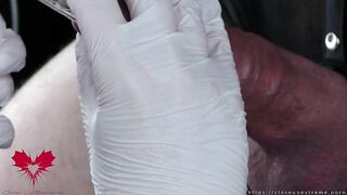 Flawless extraction of semen directly from the urethra. Close-up of the glass straw sounding.