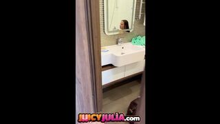 Soaked Julia peeing in baths and showing her large melons