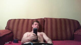 Watching porn playing with a blue fleshlight