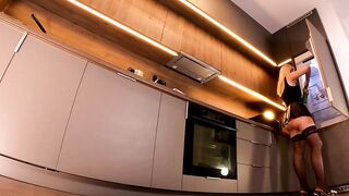 Sexy and lustful lengthy legs blond in ebony nylons shows her butt below leather petticoat to tease and get attention