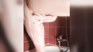 Having pleasure in the shower with a soapy finger bang