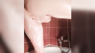 Having pleasure in the shower with a soapy finger bang