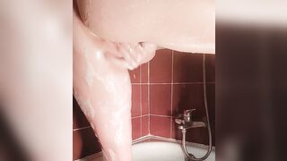 Having pleasure in the shower with a soapy finger bang