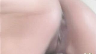Oriental minx prepares to get her fascinating booty creampied by playing with her sex toys