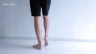 Lengthy legs and hot feet doing squats during the time that stripping