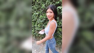 charming slim brunette hair is filmed by her boyfriend whilst this babe changes her blouse on the street