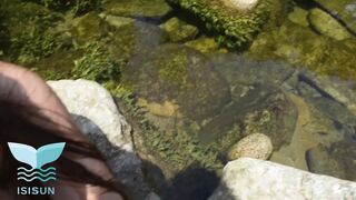 gorgeous blond is seen swimming alone undressed and warms up facial in the face