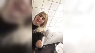 She dominates her bitch in the public restroom 