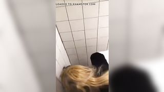 She dominates her bitch in the public restroom 