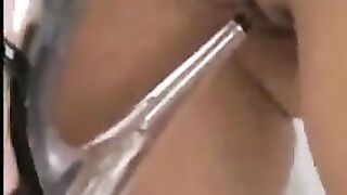 Foot-fucking brunette milf rubs her big clit with stiletto