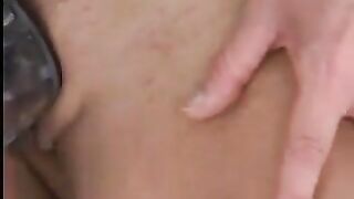 Foot-fucking brunette milf rubs her big clit with stiletto