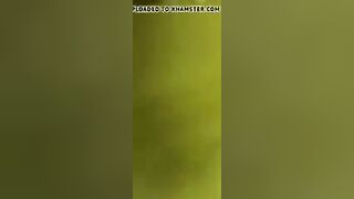 2 lesbians in a bar bathroom.