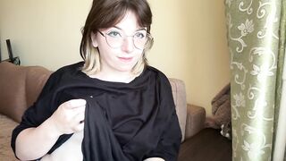 Impressive brunette hair in a t-shirt shows off her lush boobs