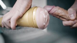 Large white knob permeating fleshlight and thick cum