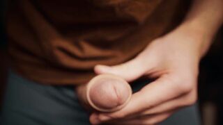 hunk with a large knob playing with his foreskin in 4K