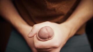 hunk with a large knob playing with his foreskin in 4K