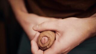 hunk with a large knob playing with his foreskin in 4K