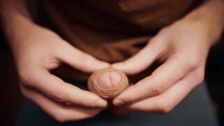 hunk with a large knob playing with his foreskin in 4K