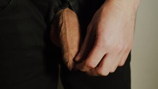 Thick uncut jock growing in ebony jeans. Natural foreskin. Cum on ebony plate.