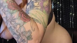 Redhead swallows a toy ramrod and vibrates her love button