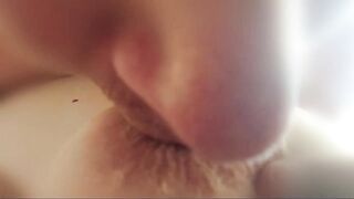 giving a kiss older mommy's wrinkled nipp close-up