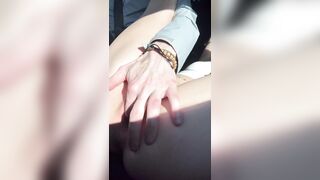Fingering her cunt whilst driving