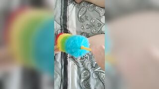 duster cleaning the dust from my curvy wife
