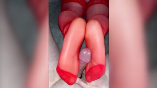 Amateur footjob in the red hose large cum