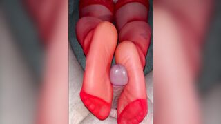 Amateur footjob in the red hose large cum