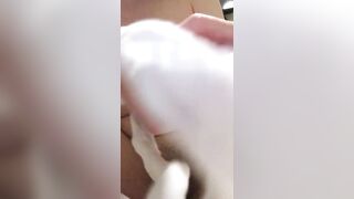 Masturbation of sexually excited cunt throughout white pants close-up