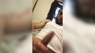 Tatted puerto rican chap rubs his uncut glamorous dong