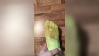 Enjoying in fresh neon dotted green socks