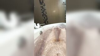 Stomach button fetish in the bathroom, lengthy legs and constricted charming cunt underneath water close up
