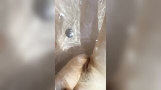 Stomach button fetish in the bathroom, lengthy legs and constricted charming cunt underneath water close up