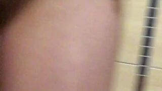 Pissing gal, piddle stream down her legs. Beauty peeing in her hand