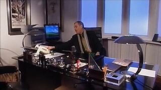 Boss enjoys his secretary on his desk