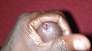 Afro male malik playing with his dong and cum