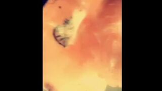 big beautiful woman large bazookas lathered up with soap in the shower