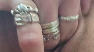 Pulls pants to the sides and fingers and explores wet twat