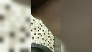 A beauty in taut jeans went to pee in the mall WC