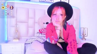 Cute redhead with a cute face shows her breasts and snatch on cam show