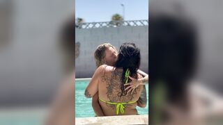 Hot lesbo makeout with back tattoo visible