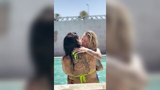 Hot lesbo makeout with back tattoo visible