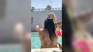 Hot lesbo makeout with back tattoo visible