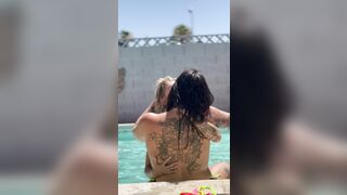 Hot lesbo makeout with back tattoo visible