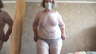 Trying on fresh white pants. A aged big beautiful woman shakes her large booty. PAWG.