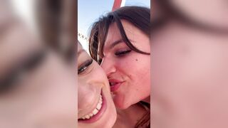Pleasant and sexy kisses between real lesbo pair with large melons and tiny bikinis
