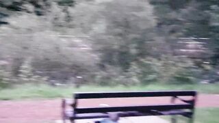 pissing and screwing a bottle in the park